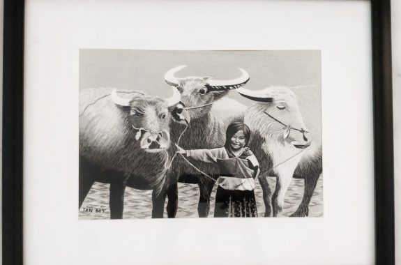 Hand-embroidered painting - ethnic girl with buffalos